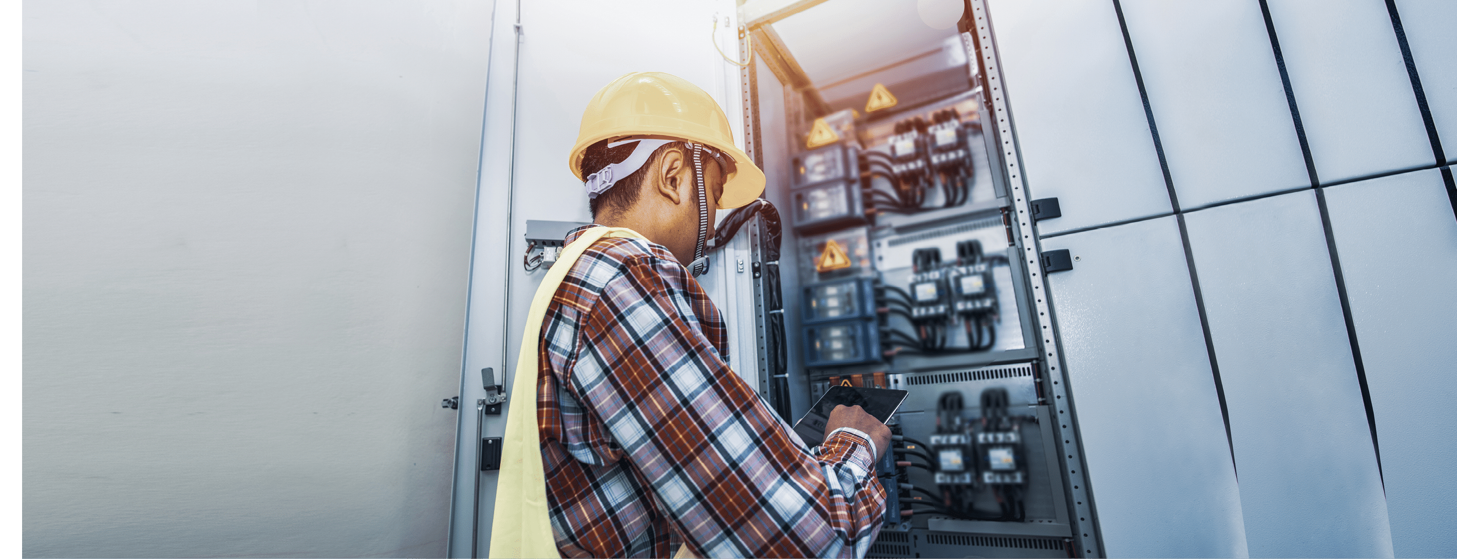 Control cabinet ,Control Room Engineer  Power Plant Control Panel  Engineer standing in front of the control panel in the control room 