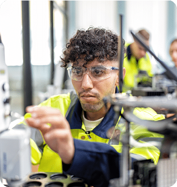 Engineer learn basic theory how to operation maintenance and programing robot arm in training room